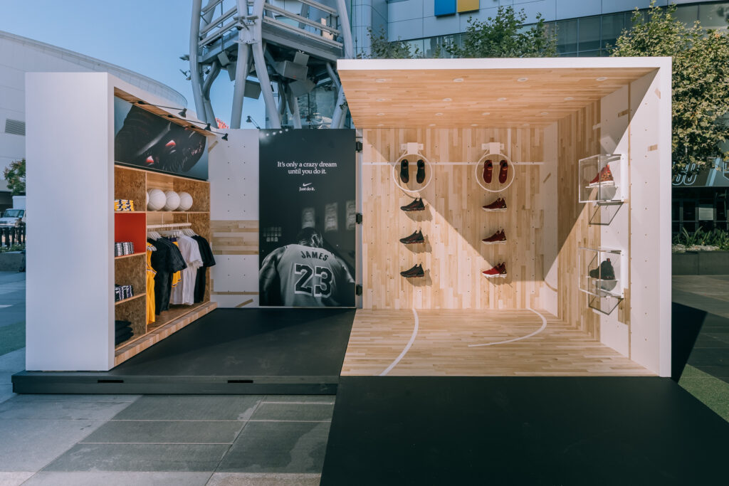 an open-air booth with shoes on display